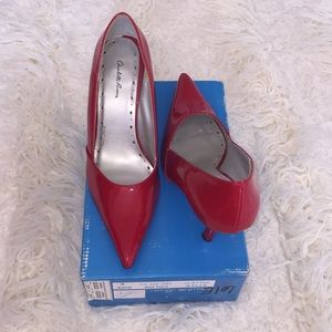 Pointy red heels